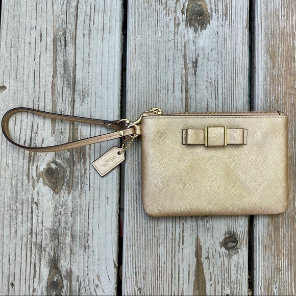 Coach Darcy Gold Bow Wristlet - Picture 1 of 4